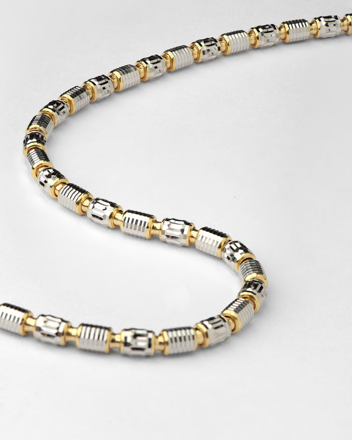Dettaglio collana in argento bicolore Barrel Pioneer placcata rodio e oro giallo