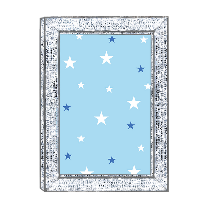 Framed artwork with blue background and white and blue stars, silver frame.
