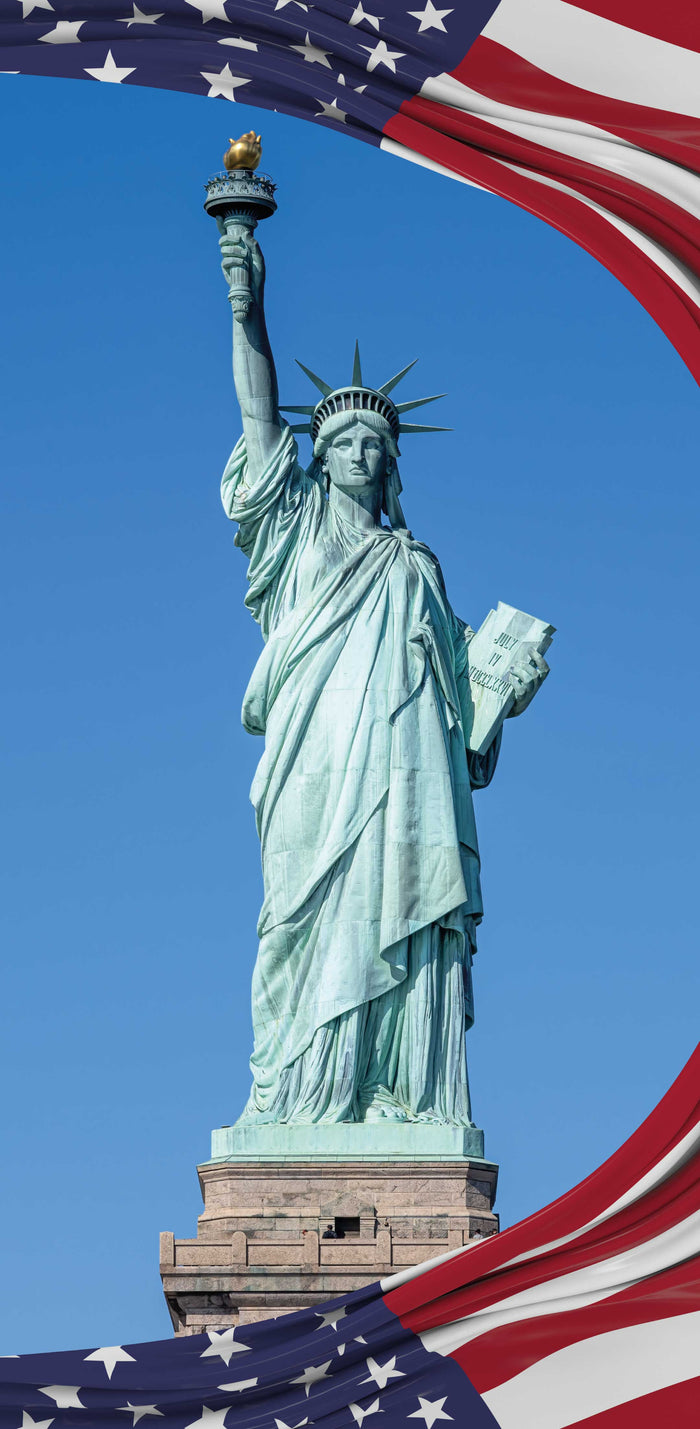 Statue of Liberty with American flag in the foreground