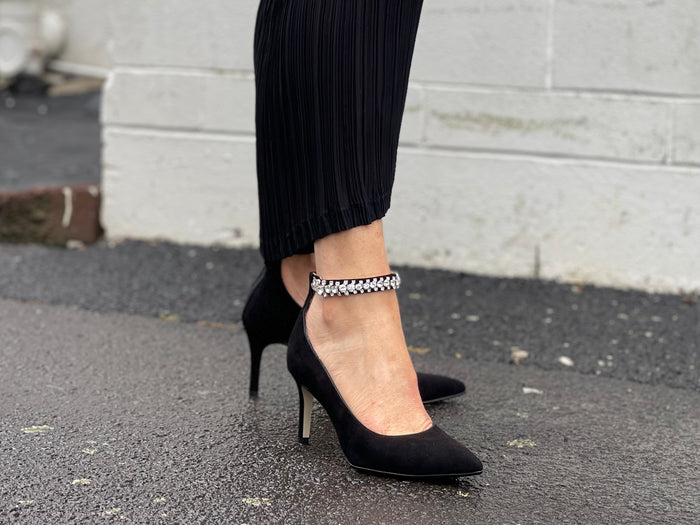 Comfortable, quality European women's sandals with a medium stiletto heel and beautiful diamante detail round the ankle strap.  Wedding or special occasion shoe in black suede leather.