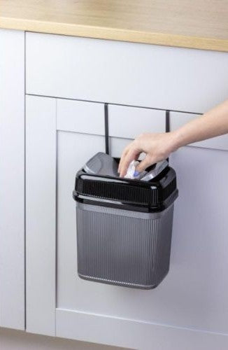 trash can contents and components flat lay